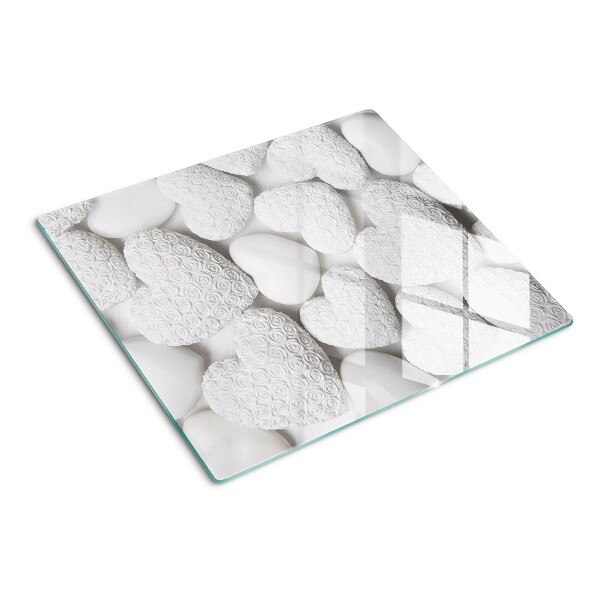 Tabla de cortar de cristal Corazones blancos con un patrón