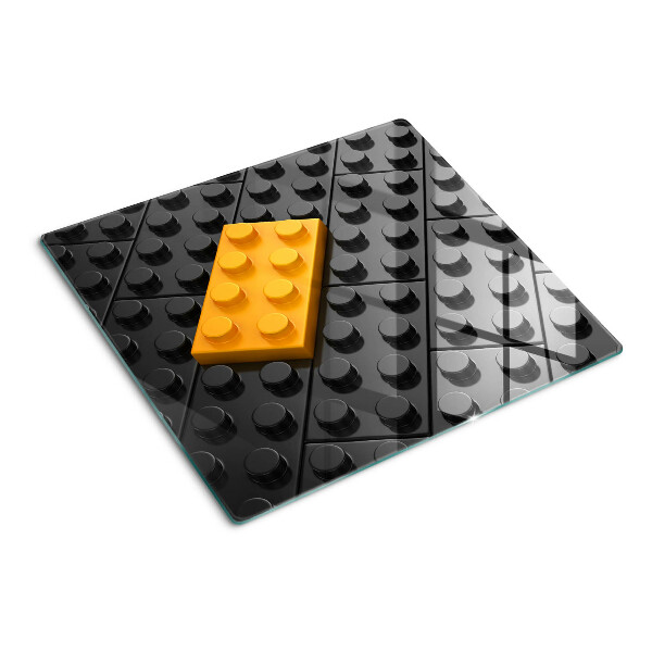Tabla de cortar de cristal Ladrillos LEGO sobre fondo negro