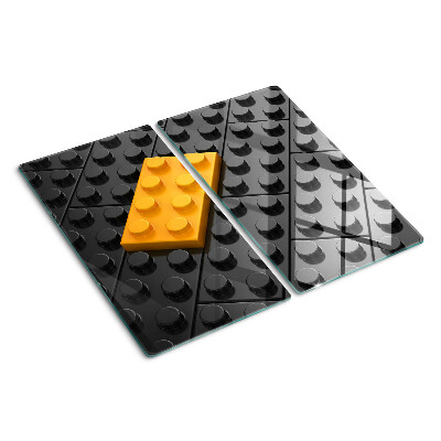 Tabla de cortar de cristal Ladrillos LEGO sobre fondo negro