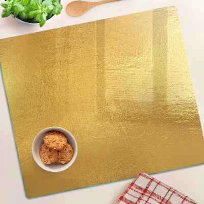 Tabla de cortar de cristal Superficie dorada con reflejos
