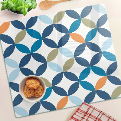 Tabla para cortar Hojas geométricas en diferentes colores.