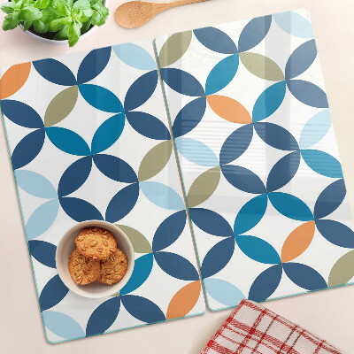 Tabla para cortar Hojas geométricas en diferentes colores.
