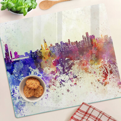 Tabla para cortar Panorama de la ciudad en puntos coloridos