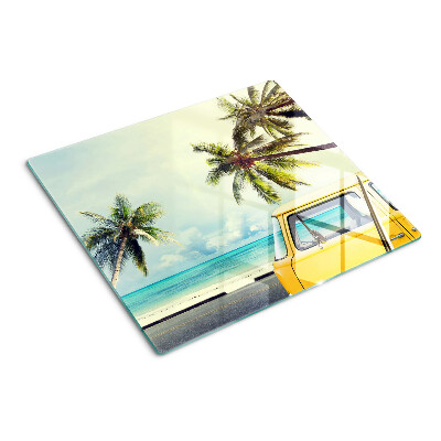 Tabla para cortar Playa con palmeras y un coche.