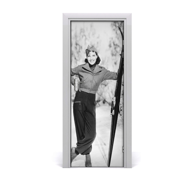 Vinilo para puerta Una mujer con esquí