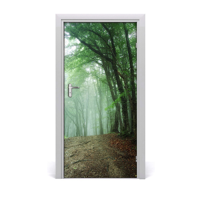 Vinilo para puerta Niebla en el bosque