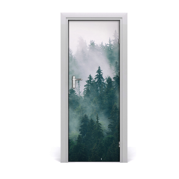 Vinilo para puerta Niebla por encima del bosque