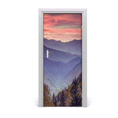 Vinilo para puerta Niebla por encima del monte