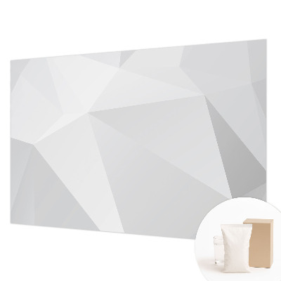 Fotomural decorativo para cabecero de cama con un diseño de triángulos grises