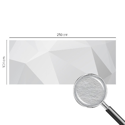 Fotomural decorativo para cabecero de cama con un diseño de triángulos grises