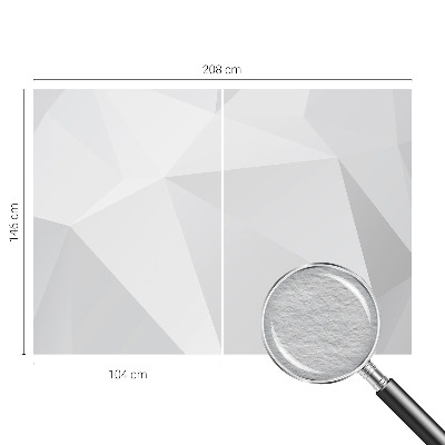 Fotomural decorativo para cabecero de cama con un diseño de triángulos grises