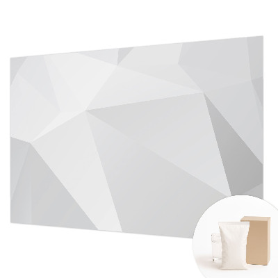Fotomural decorativo para cabecero de cama con un diseño de triángulos grises