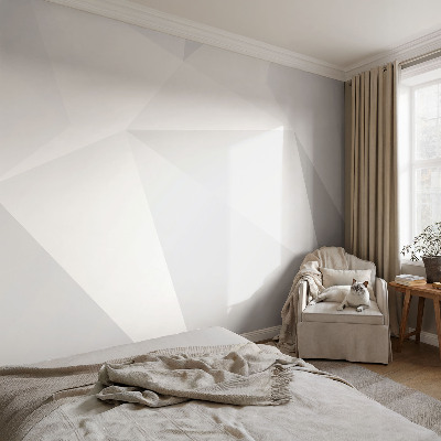 Fotomural decorativo para cabecero de cama con un diseño de triángulos grises