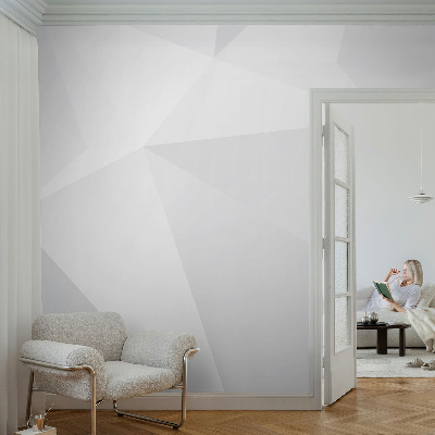 Fotomural decorativo para cabecero de cama con un diseño de triángulos grises