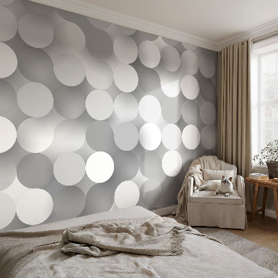 Mural decorativo con diseño de círculos grises