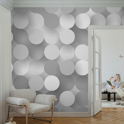 Mural decorativo con diseño de círculos grises