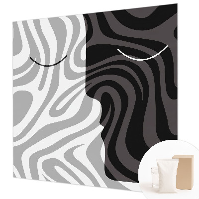 Mural decorativo con diseño de caras abstractas