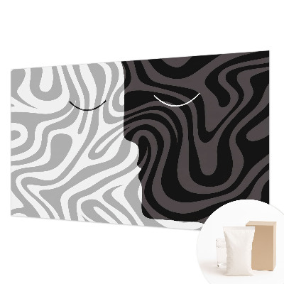 Mural decorativo con diseño de caras abstractas