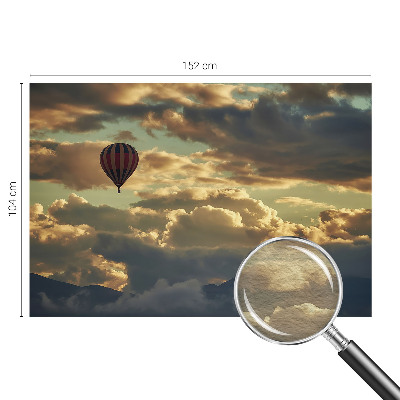 Mural de pared con estampado hermoso con el diseño de un globo entre nubes