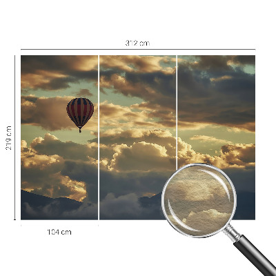 Mural de pared con estampado hermoso con el diseño de un globo entre nubes