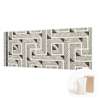 Mural decorativo con un diseño de laberinto de ladrillos
