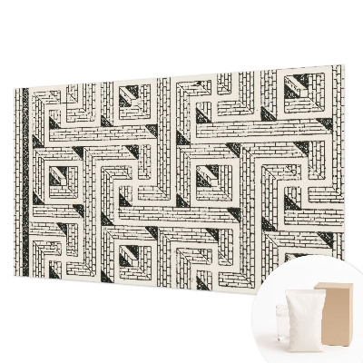 Mural decorativo con un diseño de laberinto de ladrillos