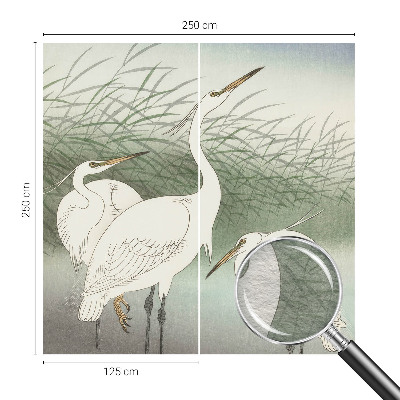 Mural decorativo con diseño de garzas entre la hierba