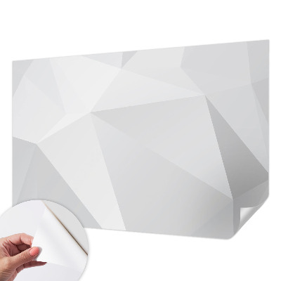 Papel mural con patrón decorativo con motivos de triángulos grises