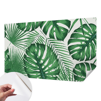 Papel mural con patrón decorativo con motivo de hojas tropicales