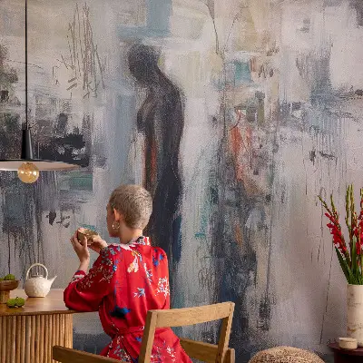 Papel mural con patrón decorativo con una figura misteriosa