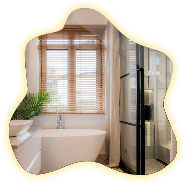 Espejo en forma de mancha con iluminación LED