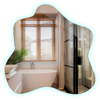 Espejo en forma de mancha con iluminación LED