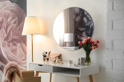 Espejo redondo decorativo en la pared sin marco