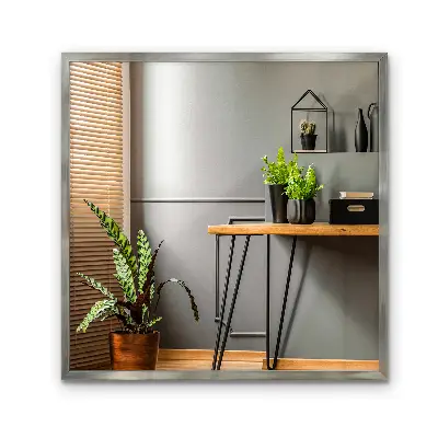 Espejo de pared con marco plateado moderno y elegante