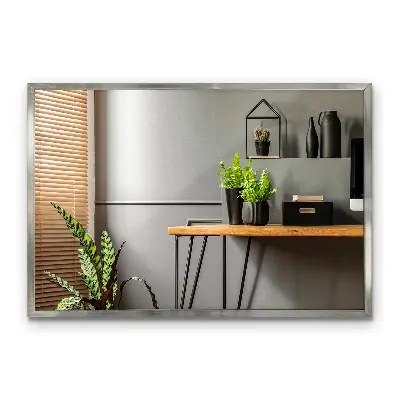 Espejo de pared con marco plateado moderno y elegante