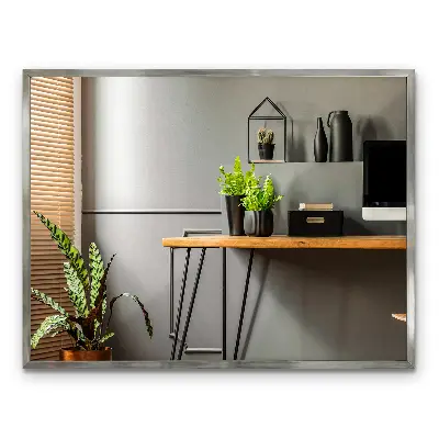 Espejo de pared con marco plateado moderno y elegante
