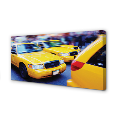 Cuadros sobre lienzo Taxi amarillo de la ciudad