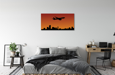 Cuadros sobre lienzo Cielo avión y la puesta del sol