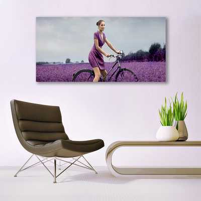 Cuadro en lienzo canvas Mujer bicicleta prado hombre