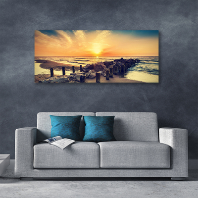 Cuadro en lienzo canvas Playa rompeolas mar puesta del sol