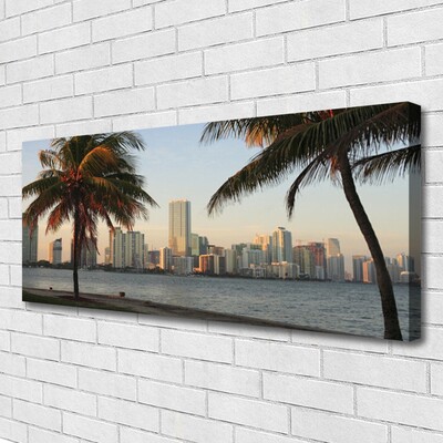 Cuadro en lienzo canvas Palmeras trópicos ciudad mar
