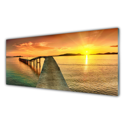 Cuadro en vidrio Mar sol puente paisaje