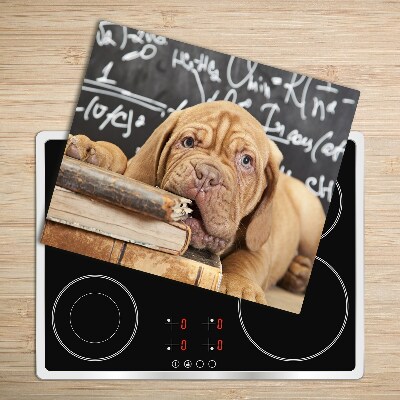 Tabla de cortar de vidrio Perro mordiendo un libro