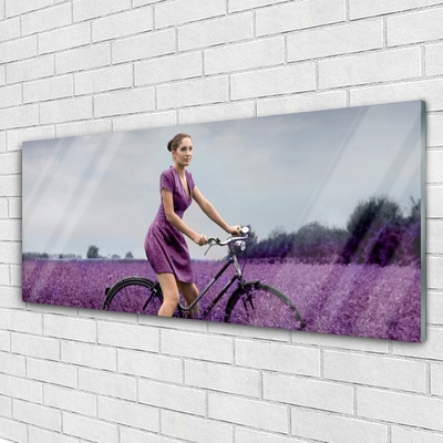 Cuadro en plexiglás Mujer bicicleta prado hombre