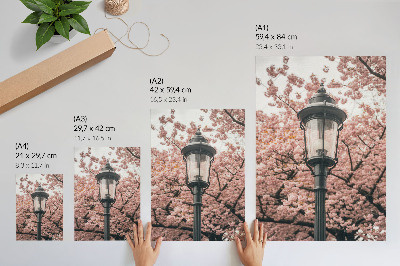 Lienzo decorativo moderno Árboles rosas, linterna negra, ambiente nostálgico