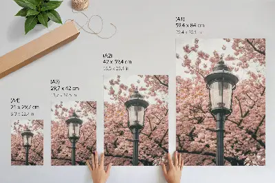 Lienzo decorativo moderno con diseño de árboles rosas y linterna negra de ambiente nostálgico