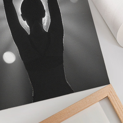 Lienzo decorativo moderno Una silueta marcada contra los rayos de luz.