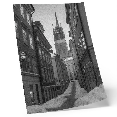 Póster Una calle estrecha con la catedral al fondo.