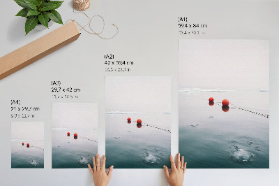 Póster Boyas de hielo de agua sobre fondo naranja frío