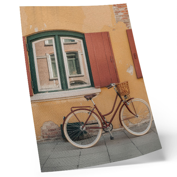 Lienzo decorativo moderno Una bicicleta con el telón de fondo de una colorida fachada retro.